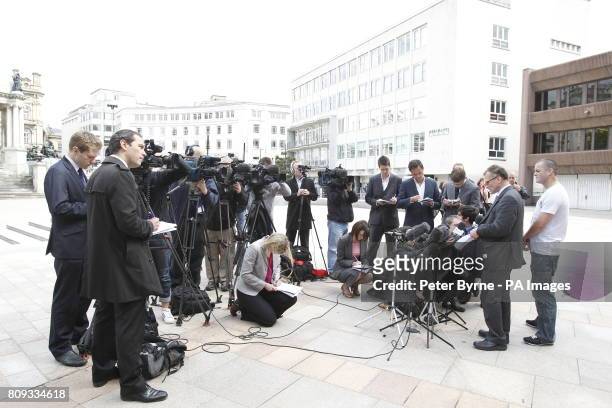 Solicitor Robin Makin read a statement to the media as Ralph Bulger , the father of James Bulger, looks on outside Liverpool Crown Court as they made...