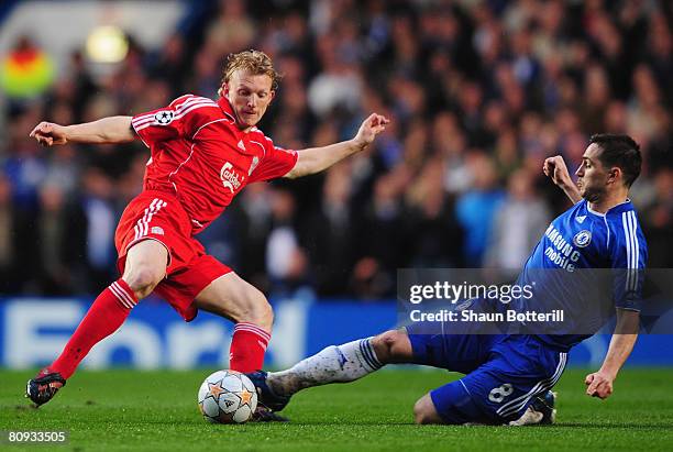 Dirk Kuyt of Liverpool is tackled by Frank Lampard of Chelsea during the UEFA Champions League Semi Final 2nd leg match between Chelsea and Liverpool...