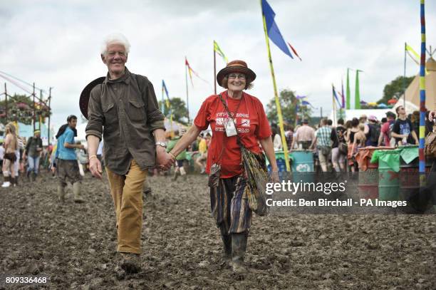 Year-old festival virgins Richard Hopkinson and Meryl Knapp enjoying their first ever Glastonbury festival at Worthy Farm, Pilton.