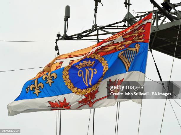 The flag of the Duke of Cambridge flies from the top of HMCS Montreal as the Duke and Duchess disembark at Quebec City after travelling down river...