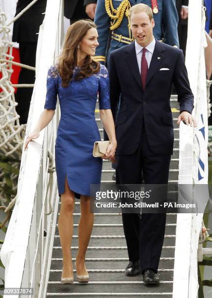 The Duke and Duchess of Cambridge walk down the gangway of HMCS Montreal, following a morning prayer service on the helicopter pad at the rear of the...