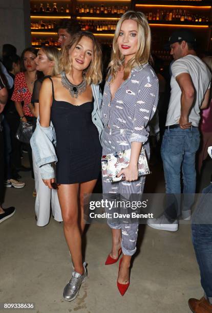 Tess Ward and Laura Whitmore attend the Warner Music Group and British GQ Summer Party in partnership with Quintessentially at Nobu Hotel Shoreditch...