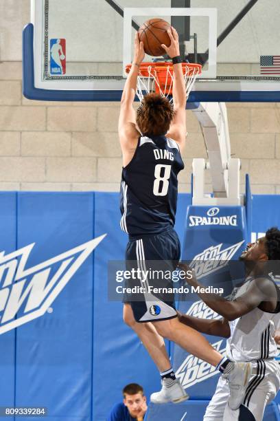 Ding Yanyuhang of the Dallas Mavericks dunks the ballagainst the Oklahoma City Thunder during the Mountain Dew Orlando Pro Summer League on July 5,...