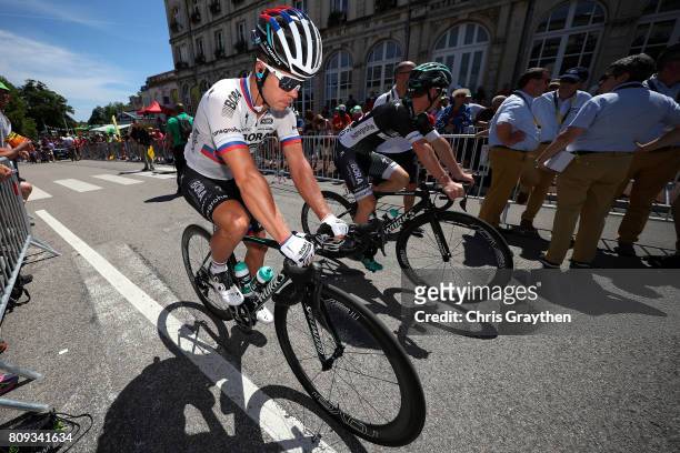 Juraj Sagan of Slovakia riding for Bora-Hansgrohe rides past UCI Commisares prior to stage five of the 2017 Le Tour de France, a 160.5km stage from...