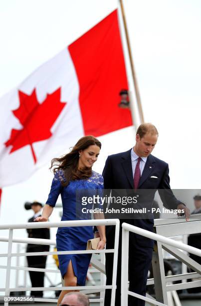 The Duke and Duchess of Cambridge walk down the gangway of HMCS Montreal, following a morning prayer service on the helicopter pad at the rear of the...