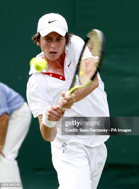 Australia's Andrew Whittington in action against Great Britain's Luke Bambridge in the first round of the Boy's Singles