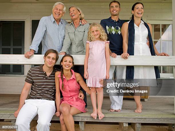 three generation family on veranda - tia imagens e fotografias de stock
