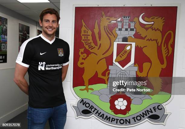 Northampton Town new signing Ash Taylor poses during a photo call at Sixfields on July 5, 2017 in Northampton, England.