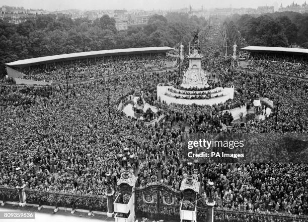 Massive crowd outside Buckingham Palace and down The Mall, waiting to see Queen Elizabeth II on the balcony of Buckingham Palace after her Coronation...