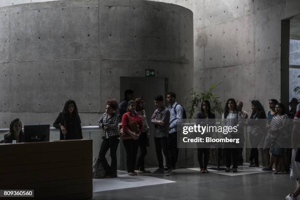 Job seekers stand on line at Natura Cosmeticos SA headquarters in the town of Cajamar, Sao Paulo State, Brazil, on Wednesday, June 28, 2017. British...