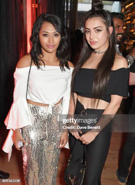 Vanessa White and Charli XCX attend the Warner Music Group and British GQ Summer Party in partnership with Quintessentially at Nobu Hotel Shoreditch...