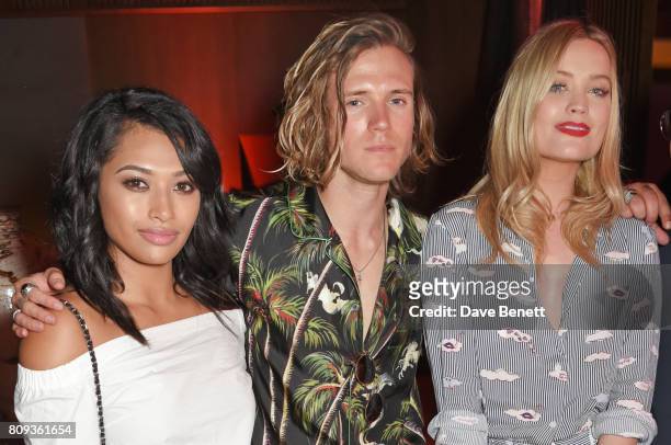 Vanessa White, Dougie Poynter and Laura Whitmore attend the Warner Music Group and British GQ Summer Party in partnership with Quintessentially at...