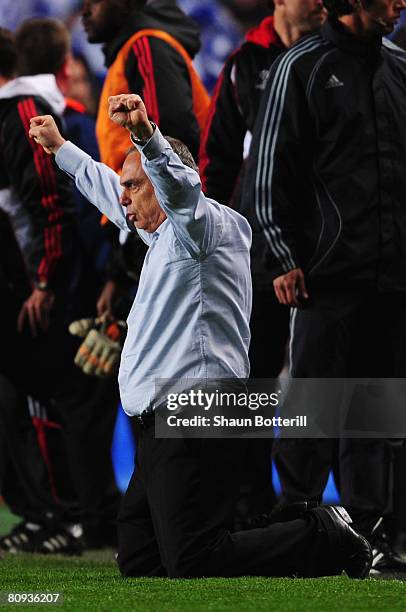 Avram Grant manager of Chelsea celebrates victory following the UEFA Champions League Semi Final 2nd leg match between Chelsea and Liverpool at...