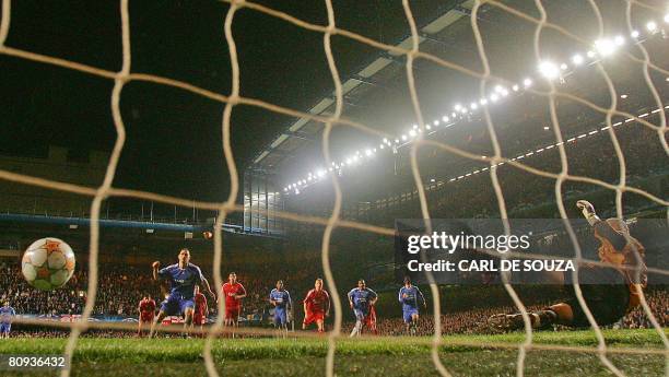 Chelsea's Frank Lampard scores a penalty against Liverpool during the second leg of a UEFA Champions League semi-final game at Stamford Bridge in...