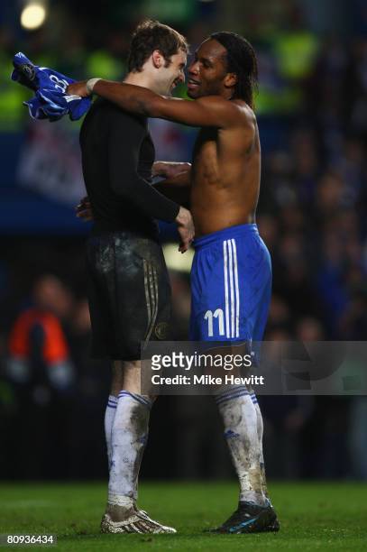 Petr Cech of Chelsea celebrates with Didier Drogba as the are victorious during the UEFA Champions League Semi Final 2nd leg match between Chelsea...