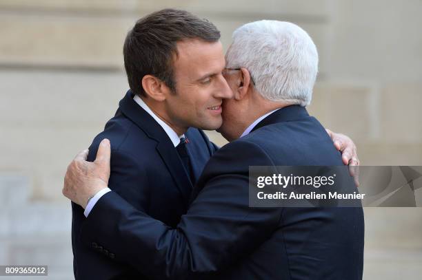 French President Emmanuel Macron welcomes Palestinian President Mahmoud Abbas for a meeting at Elysee Palace on July 5, 2017 in Paris, France....