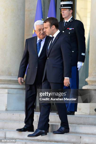 French President Emmanuel Macron escorts Mahmoud Abbas after a meeting at Elysee Palace on July 5, 2017 in Paris, France. Palestinian President...