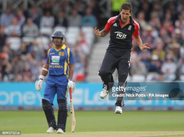 England's Jade Dernbach celebrates taking the wicket of Sri Lanka batsman Lasith Malinga during the fourth Natwest ODI match at Trent Bridge,...