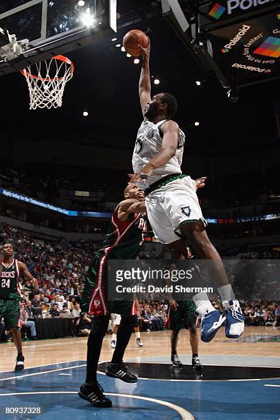 Al Jefferson of the Minnesota Timberwolves goes up for the shot during the NBA game against the Milwaukee Bucks at the Target Center on April 16,...