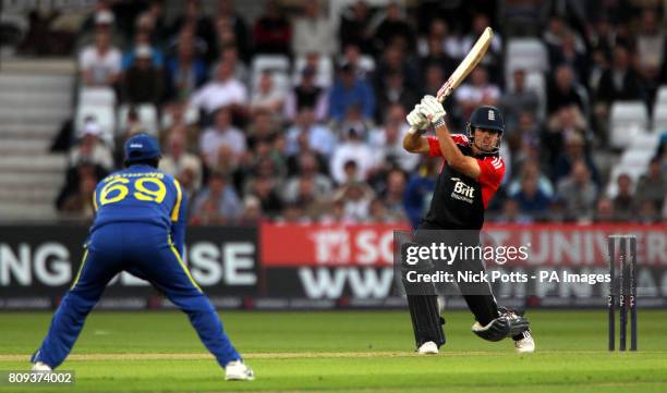 England's captain Alastair Cook drives the ball for four runs during the fourth Natwest ODI match at Trent Bridge, Nottingham.