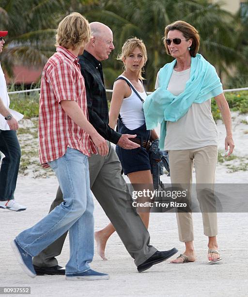 Actor Owen Wilson, his father Robert Wilson, actress Jennifer Aniston, his mother Laura Wilson are seen filming a scene from the movie "Marley & Me"...