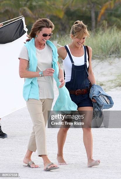 Actor Owen Wilson's mother Laura Wilson and actress Jennifer Aniston are seen filming a scene from the movie "Marley & Me" at the beach behind the...