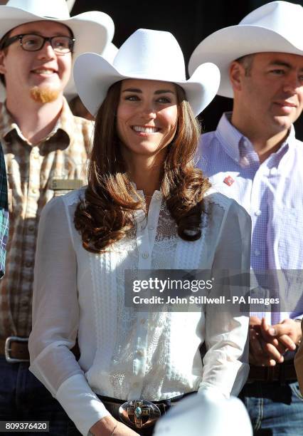 The Duchess of Cambridge wears a Stetson hat as she views the start of the Calgary Stampede parade in western Canada.