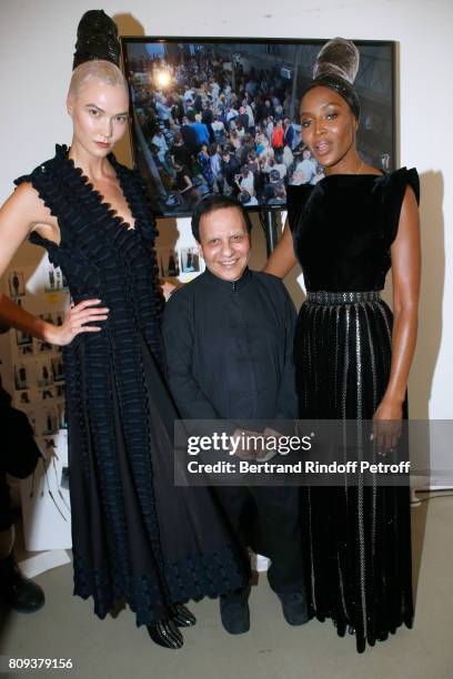 Stylist Azzedine Alaia poses with Karlie Kloss and Naomi Campbell after the Azzedine Alaia Fashion Show as part of Haute Couture Paris Fashion Week....