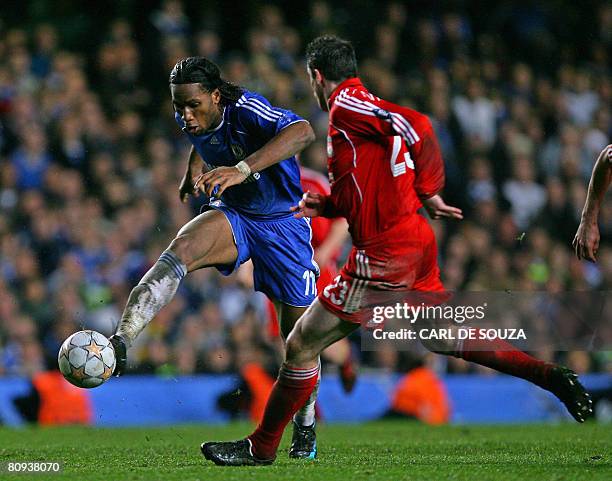 Chelsea's Didier Drogba powers through the Liverpool defence during a UEFA Champions League semi-final game at Stamford Bridge in London, on April...