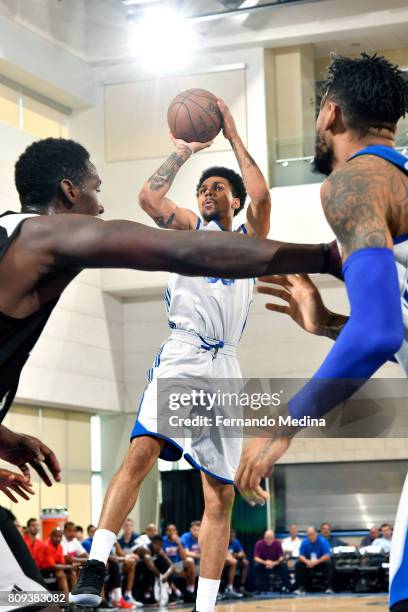 Michael Gbinije of the Detroit Pistons shoots the ball during the game against the Charlotte Hornets during the 2017 Orlando Summer League on July 5,...