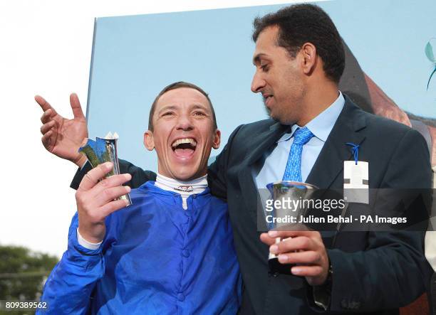 Frankie Dettori with trainer Mahmood Al Zarooni celebrate winning the Darley Irish Oaks during the Darley Irish Oaks Weekend at Curragh Racecourse,...