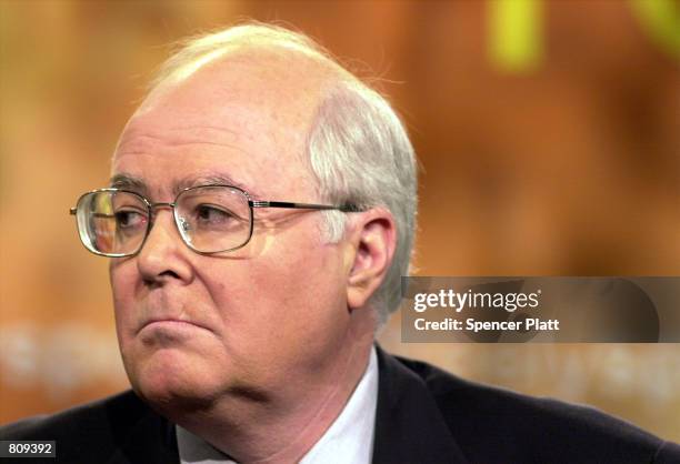 William A. Donahue, president of the Catholic League for Religious and Civil Rights, listens to a point February 20, 2001 made by photographer Renee...