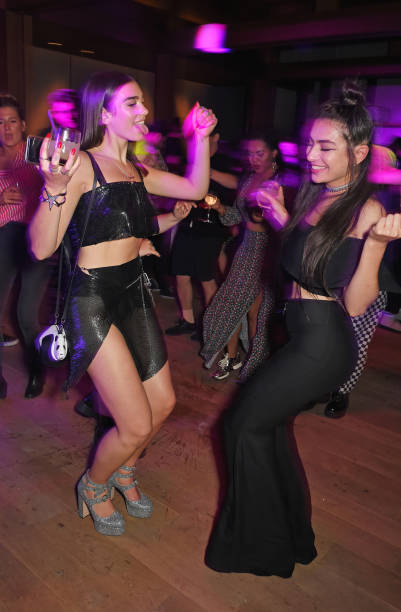 Dua Lipa and Charli XCX attend the Warner Music Group and British GQ Summer Party in partnership with Quintessentially at Nobu Hotel Shoreditch on...