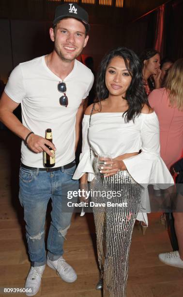 Jeremy Irvine and Vanessa White attend the Warner Music Group and British GQ Summer Party in partnership with Quintessentially at Nobu Hotel...