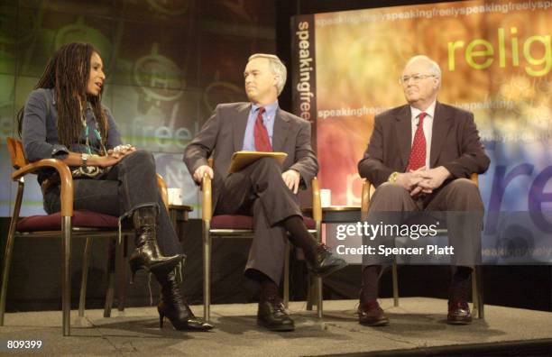 Photographer Renee Cox disputes a point February 20, 2001 with William A. Donahue, president of the Catholic League for Religious and Civil Rights,...