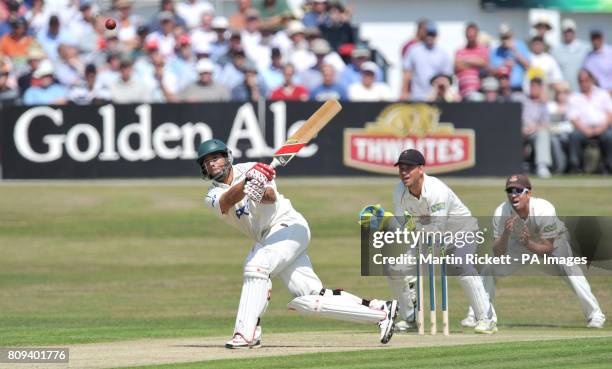 Nottinghamshire's Andre Adams hits out from the bowling of Lancashire's Gary Keedy watched by wicket keeper Gareth Cross and Paul Horton during the...