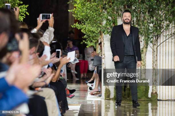 Designer Zuhair Murad walks the runway during the Zuhair Murad Haute Couture Fall/Winter 2017-2018 show as part of Haute Couture Paris Fashion Week...
