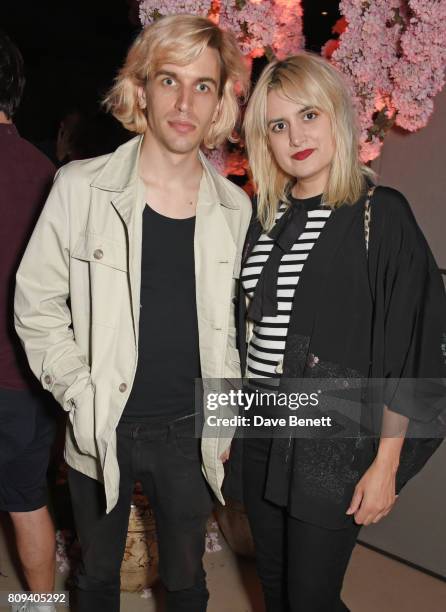 Jed Cullen and Camille Benett attend the Warner Music Group and British GQ Summer Party in partnership with Quintessentially at Nobu Hotel Shoreditch...