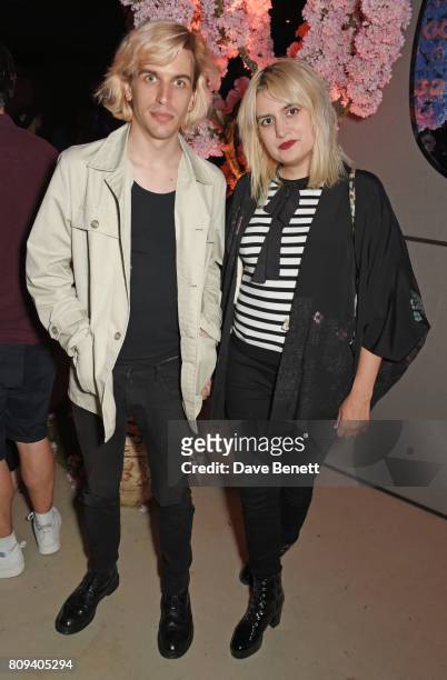 Jed Cullen and Camille Benett attend the Warner Music Group and British GQ Summer Party in partnership with Quintessentially at Nobu Hotel Shoreditch...