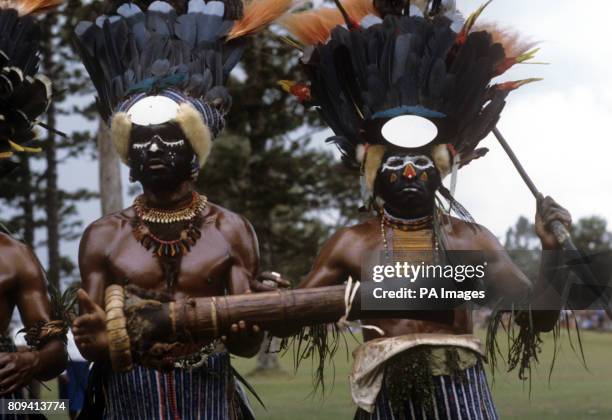 Tribesman taps out the beat on his tom-tom like drum during the Singsing held at the Old Golf course, Mt Hagen, Papua New Guinea