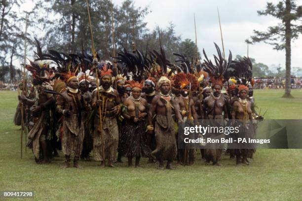 Group of Highland tribal dancers perform in front of The Queen during the Singsing held at the Old Golf course, Mt Hagen, Papua New Guinea