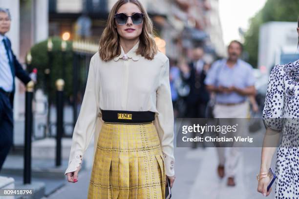 Olivia Palermo wearing a white blouse, golden Fendi skirt, heels, blue sunglasses outside Fendi during Paris Fashion Week - Haute Couture Fall/Winter...