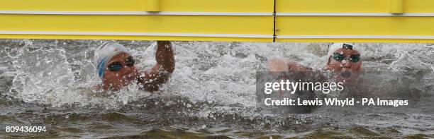 First place Martina Grimaldi and second place Eva Fabian pass the finish line of the 10k swim during the Marathon Swimming Olympic Games Test Event...