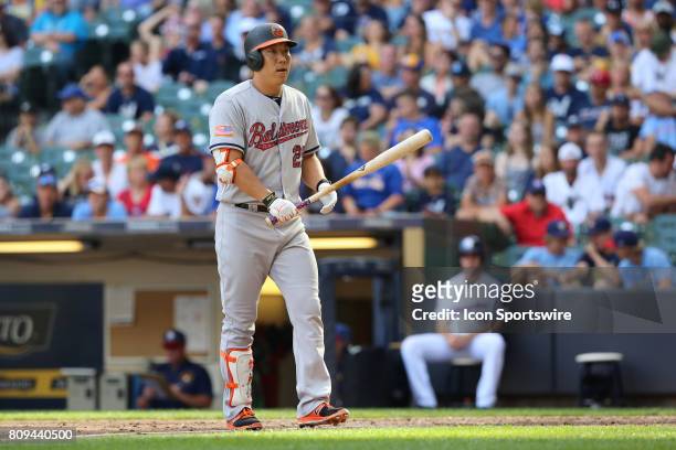 Baltimore Orioles left fielder Hyun Soo Kim walks to the dugout after being called out during a baseball game between the Milwaukee Brewers and the...