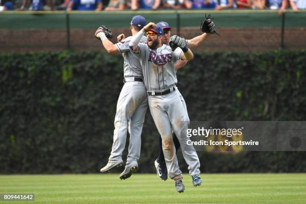 Tampa Bay Rays right fielder Steven Souza Jr. , left fielder Corey Dickerson , and center fielder Peter Bourjos celebrate after their victory after a...