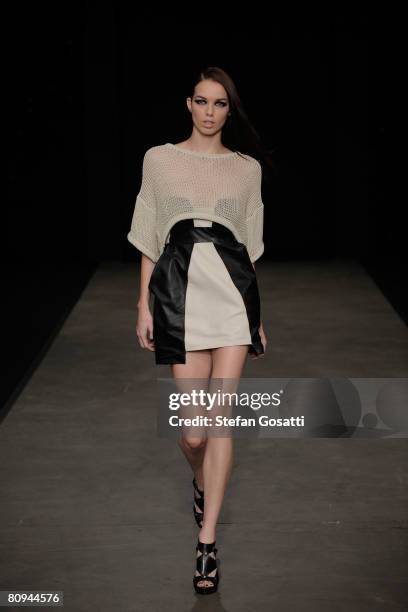 Model showcases an outift by designer Shakuhachi on the catwalk during the fourth day of the Rosemount Australian Fashion Week Spring/Summer 2008/09...