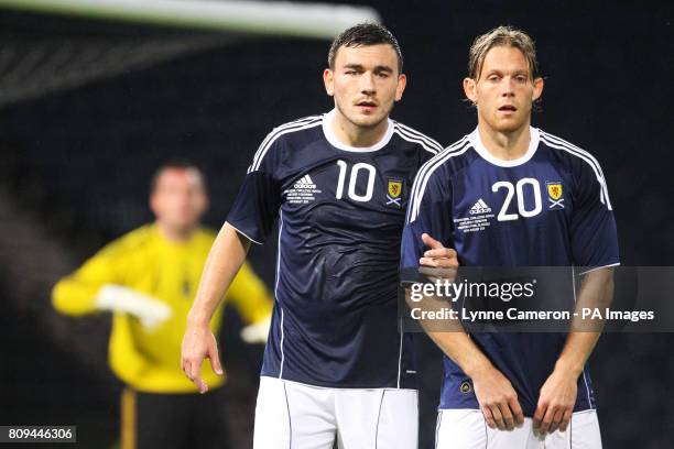 Scotland's Robert Snodgrass and Craig MacKail-Smith form a defensive wall