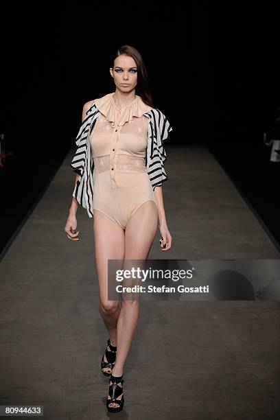 Model showcases an outift by designer Shakuhachi on the catwalk during the fourth day of the Rosemount Australian Fashion Week Spring/Summer 2008/09...