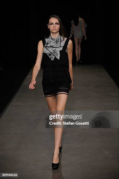 Model showcases an outift by designer Shakuhachi on the catwalk during the fourth day of the Rosemount Australian Fashion Week Spring/Summer 2008/09...