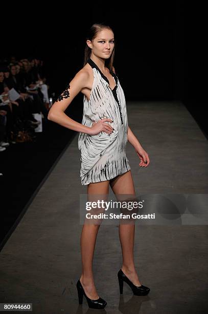 Model showcases an outift by designer Shakuhachi on the catwalk during the fourth day of the Rosemount Australian Fashion Week Spring/Summer 2008/09...